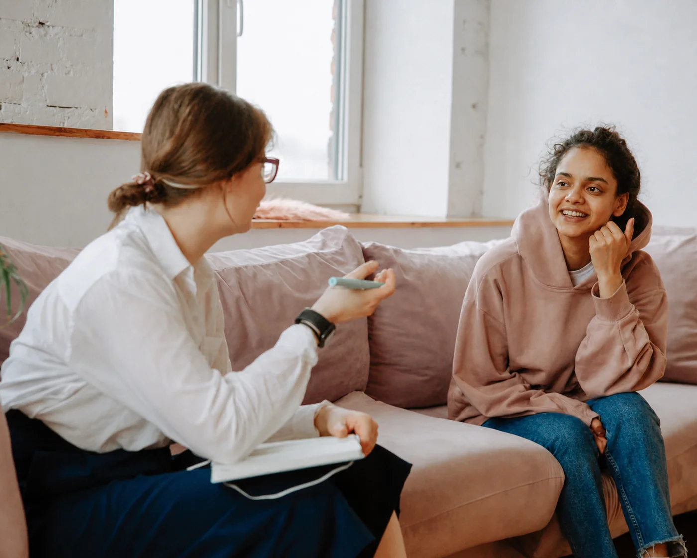 Therapist in conversation with a client
